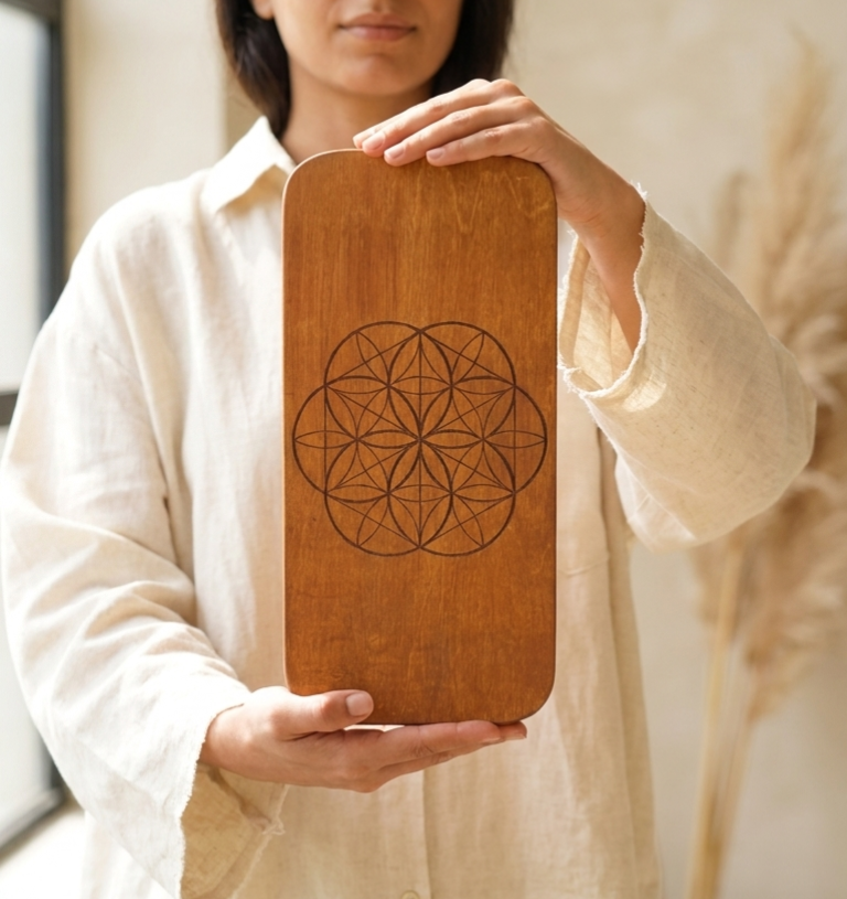 Woman using acupressure board for relaxation